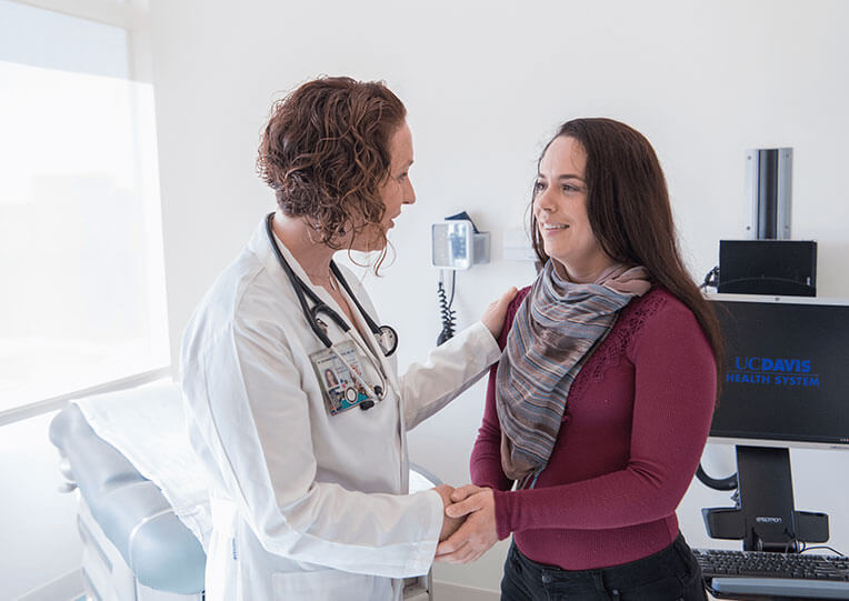 doctor talking with patient